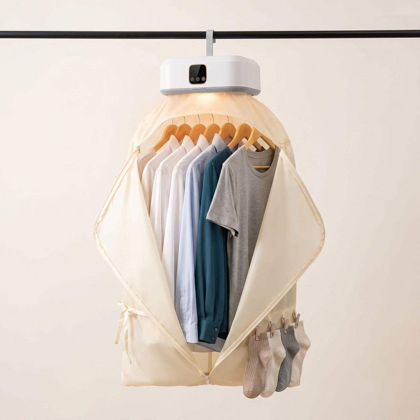 The cover unzipped and swept open, shirts on hangers and socks clipped along the bottom